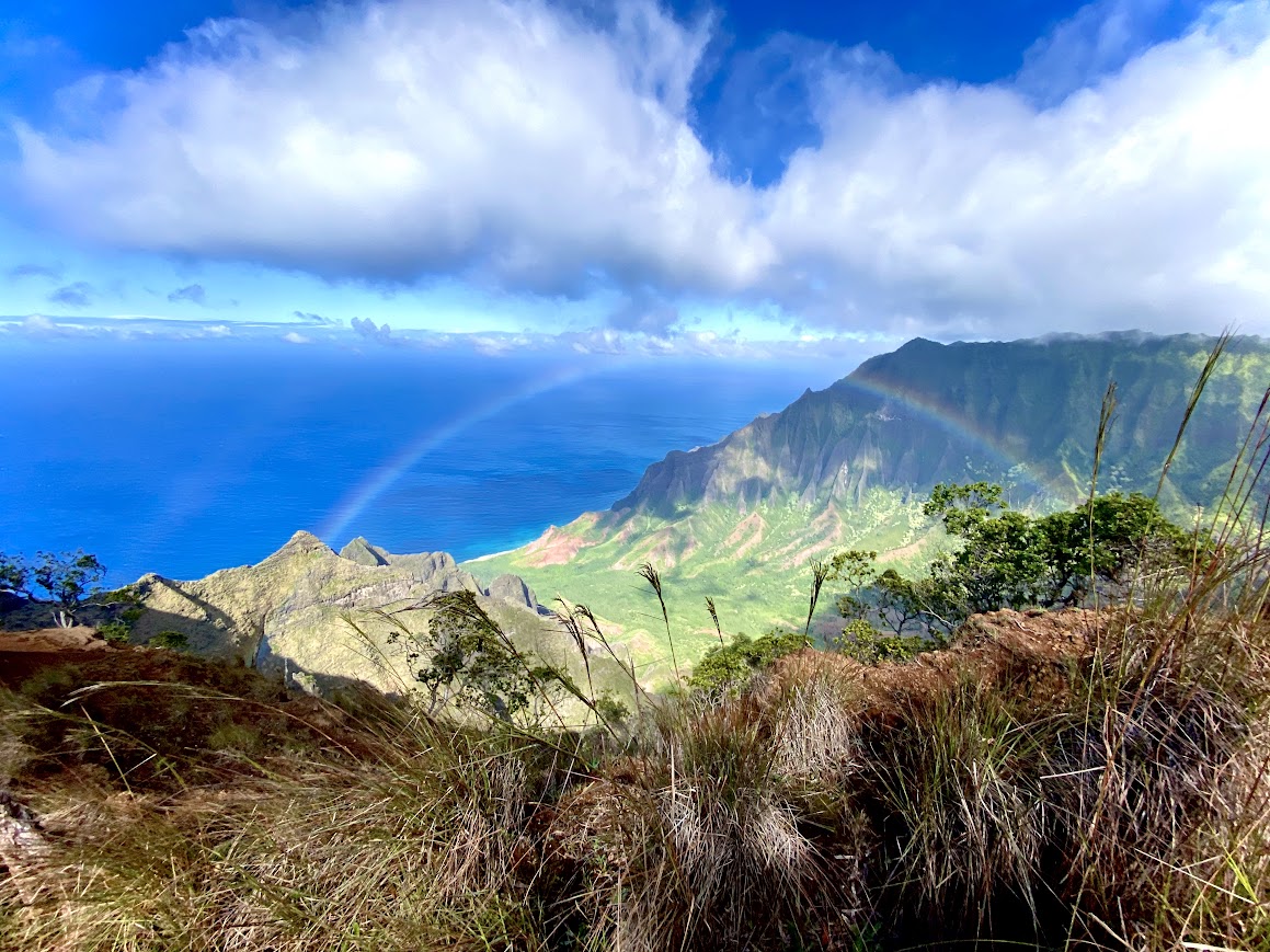 Above and Below Napali rainbow over the coast